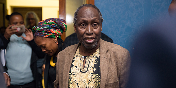 Professor Ngũgĩ wa Thiong'o on the way to deliver a public lecture entitled Secure the Base: Decolonise the Mind.