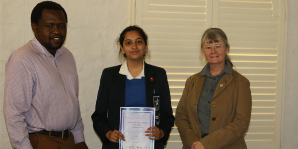 Professor Lesley Cornish (R) with the winner of the 2017 Material Science Poster Competition Ammaara Ahmed ( M) with her teacher Tebogo Maetane from Parktown Girls High School