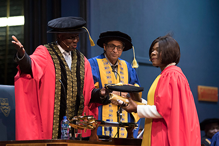 Advocate Thuli Madonsela receives her honorary doctorate in law from Wits Chancellor Dikgang Moseneke.