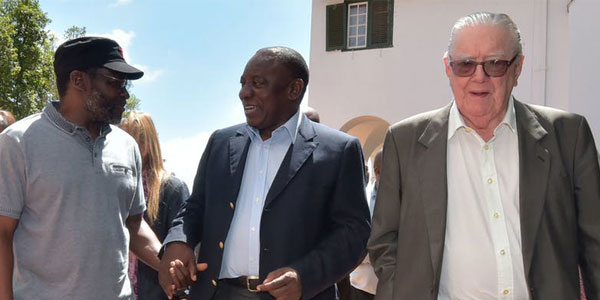 Raymond Louw, right, with then deputy president Cyril Ramaphosa, middle, and veteran journalist Mathatha Tsedu in 2015. © GovernmentZA/Flickr