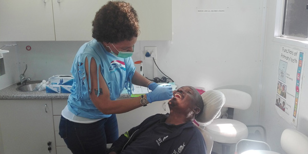 A member from the School of Oral Health during an outreach aimed at WItsies