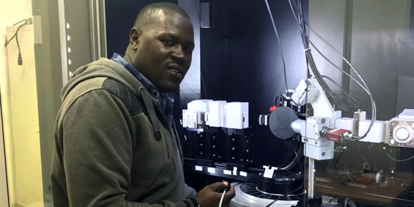 Dr Francis Otieno in the laboratory undertaking D10 Grazing Incidence X-ray diffraction at the University of the Witwatersrand’s School of Chemistry, South Africa. This technique is used to determine the phases of thin films at the sample surface and multi-layer films. Photo credit: Francis Otieno. ©Diamond Light Source