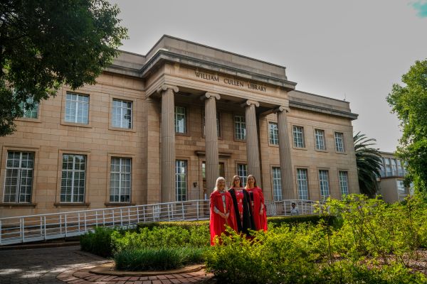Prof Anne Fitchett (L) and her daughter Prof Jennifer Fitchett (R) witnessed Jennifer’s younger sister Dr Meg Fitchett (Centre) graduate with her MMed in emergency medicine. Photos by Snippet Video