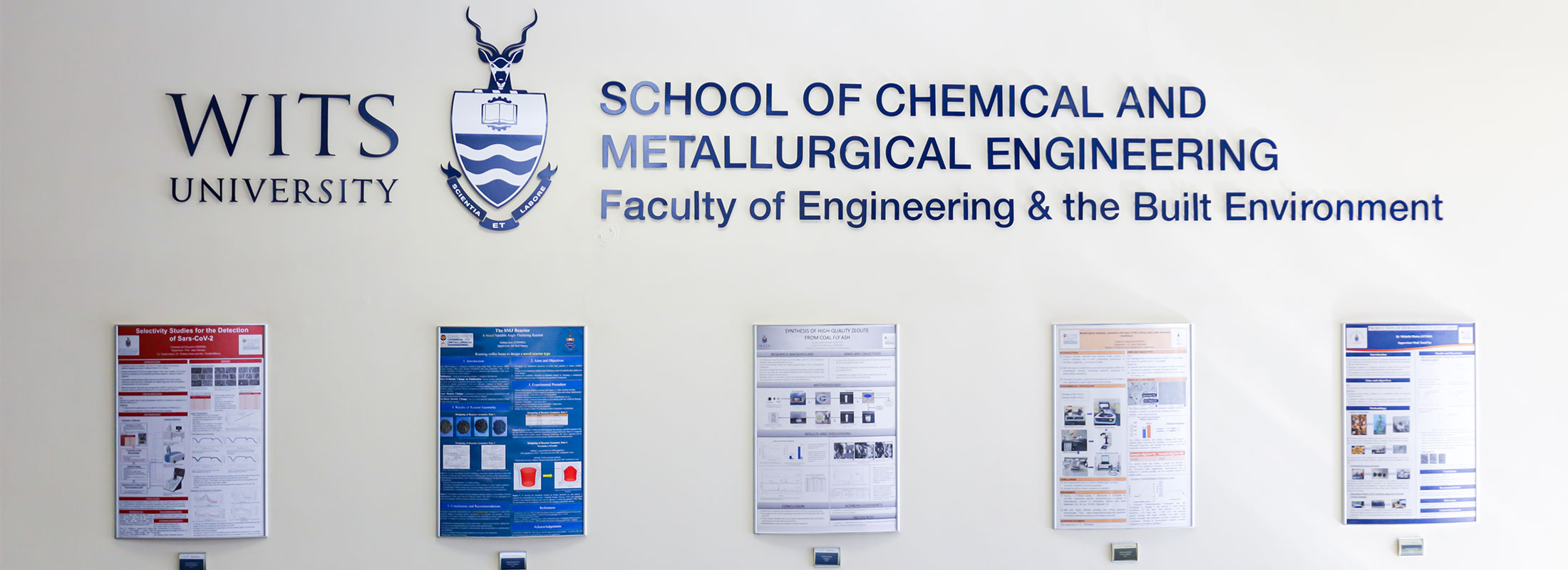 Entrance to School showing student research posters Entrance to School showing student research posters