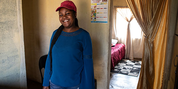 Moureen at home in Ekangala, photographed by Mark Lewis, 2022