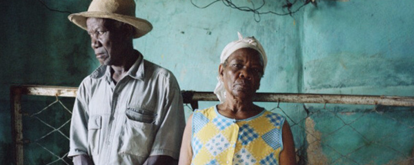 Gideon Mendel Christa and Salomon Raymond Fils, Decade Village, Haiti (2008)