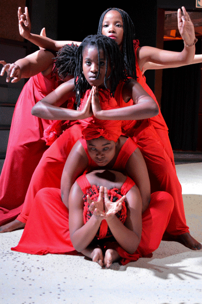 students-in-red-performing