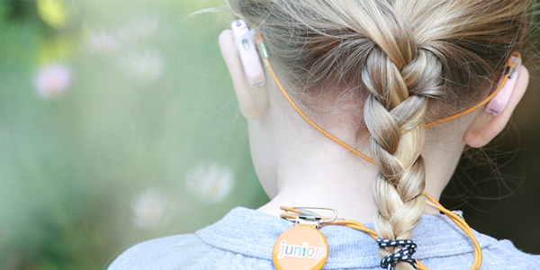 Young child with hearing aid - Hi Hopes 