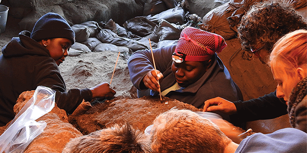 Archaeology postgrads and lecturers excavating at Klasies River main site