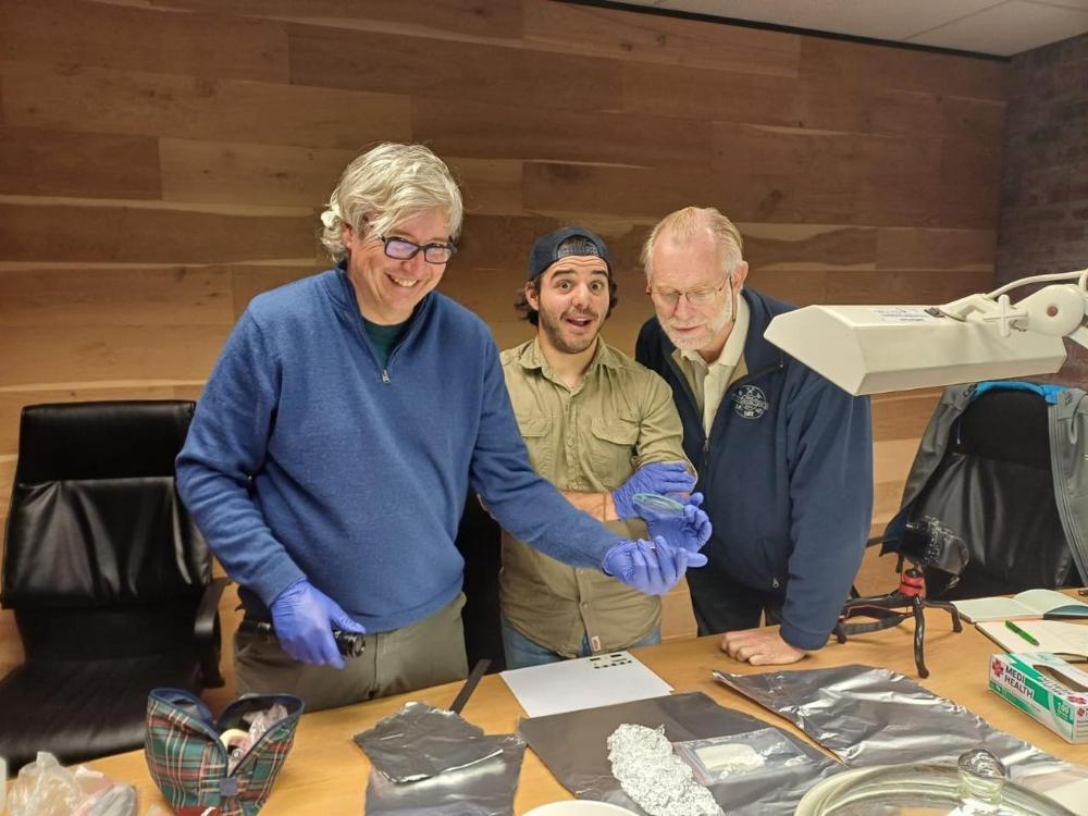 Image of reserchers with new meteorite