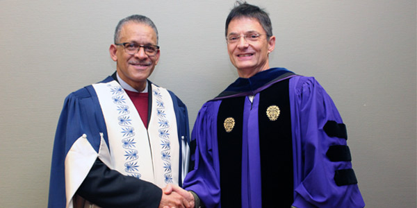 Professor Andrew Crouch congratulates Professor Keith Breckenridge on delivering his inaugural lecture.