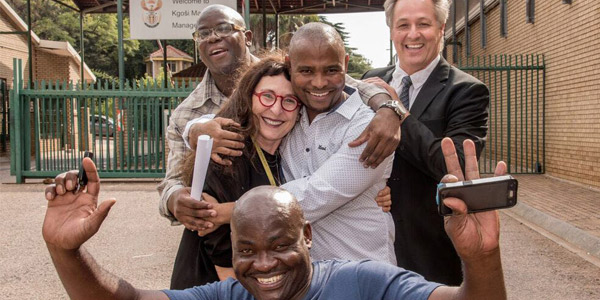 (Back) Victor Moyo, Wits Justice Project's Carolyn Raphaely, Sampie Khanye and lawyer Egon Oswald. (Front) Thembekile Molaudzi. © Carolyn Raphaely_WJP