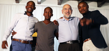 Professor Barry Dwolatzky with the three winners Methembe Dlamini (2), Thapelo Sekwena (1) and Absalom Mpanze (3)