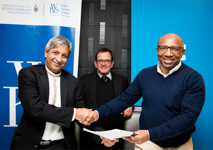 Professors Adam Habib, Vice-Chancellor at Wits, and Steve Bluen, Head of the Wits Business School, with Telkom CEO, Sipho Maseko