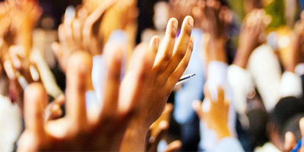 People cheering © www.wits.ac.za/curiosity/