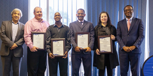 Professor Adam Habib, Mr Xerxes Seegers, Mr Koena Matjila, Mr Oscar Manqaba, Ms Nicole De Andrade and Professor Tawana Kup