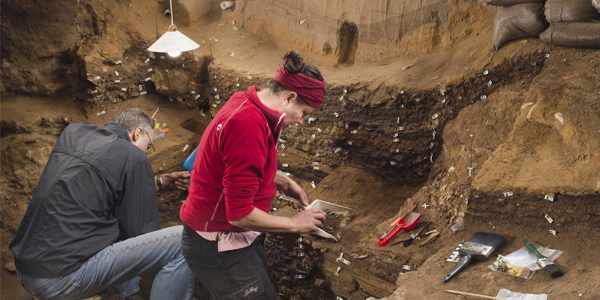 Professor Chris Henshilwood and Dr Karen van Niekerk excavating in Blombos Cave.