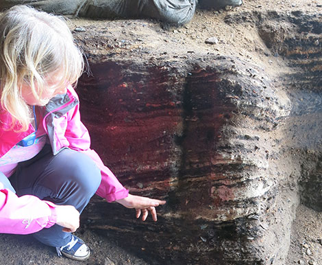 Cynthia Larbey points to an area where parenchyma were found in 65 000 year old hearths at Klasies River Cave.