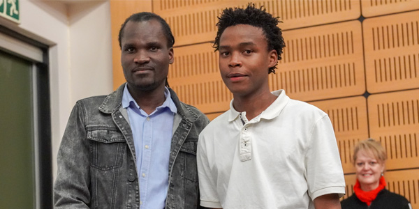 Dr Musa Manzi and Maths scholarship prize winner, Phila Mahlangu at 2019 Wits Maths Competition Dr Musa Manzi and Maths scholarship prize winner, Phila Mahlangu at 2019 Wits Maths Competition