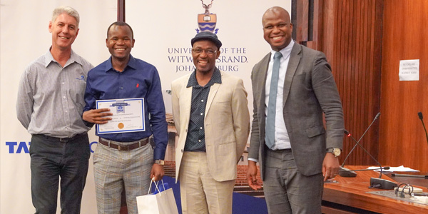 Len Brand, Lucky Nhleko, Professor Robert Muponde and Lesiba Mothata at the 2019 Tata Africa Postgraduate Scholarship awards ceremony at Wits Len Brand, Lucky Nhleko, Professor Robert Muponde and Lesiba Mothata at the 2019 Tata Africa Postgraduate Scholarship awards ceremony at Wits
