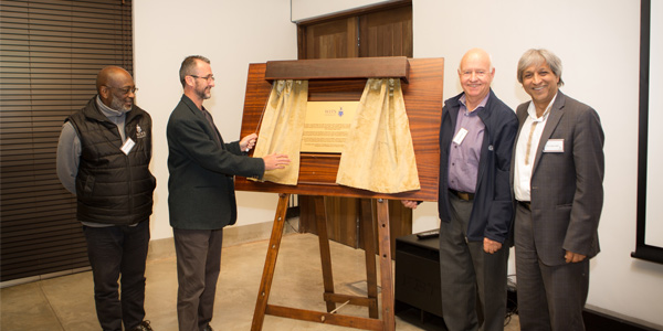  Professors Loyiso Nongxa, Wayne Twine, John Gear and Adam Habib create a “bridge of time” as they unveil a plaque that commemorates the 30th anniversary of the Wits Rural Campus. 