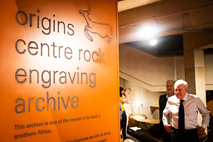 Wits Alumn Mervyn King enjoys the rock art exhibition at the opening of the rock art archive in the new wing of the Origins Centre at Wits University.