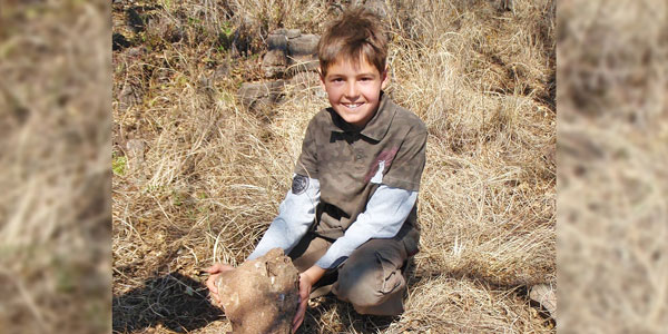 Matthew Berger with Australopithecus sediba fossil