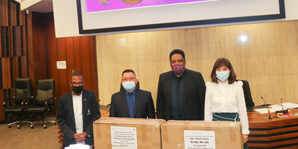 Thuto Gabaphete, Wits SRC President, Fresh Yang Yu, CEO of Cheetahway Express Pty Ltd, Jerome September, Dean of Student Affairs, Cindy Xin An, CEO of Cindystar Group at a PPE handover ceremony at Wits University