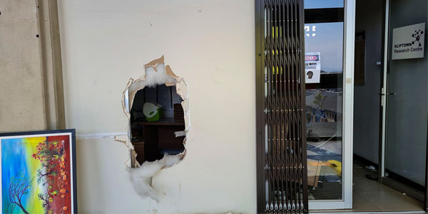 The Perinatal HIV Research Unit (PHRU) Centre entrance wall that was vandalised to gain entry to the clinic. (Photo: Anusha Nana)