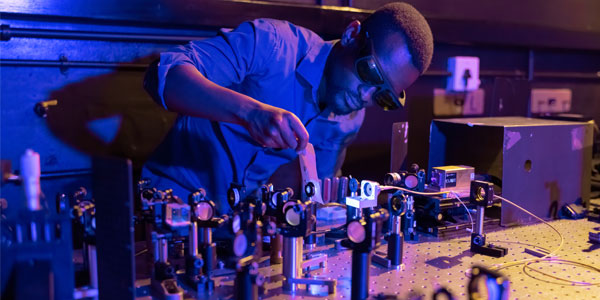 Isaac Nape, PhD student in quantum optics, setting up a quantum entanglement experiment in the Structured Light Laboratory at Wits University. CREDIT: WITS UNIVERSITY