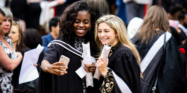 All smiles on graduation day All smiles on graduation day