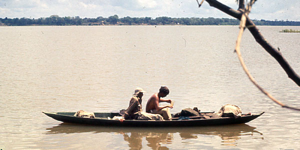 Kurt Sartorius and one of his paddling partners, Andre Holtzhausen paddle in a canoe in the Rio Madeira in 1972. Credit: Colin Amm