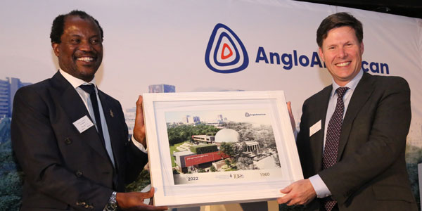 Wits Vice-Chancellor and Principal, Professor Zeblon Vilakazi, hands over artist’s impression of the new Wits Ango American Digital Dome to Anglo American CEO, Duncan Wanblad.