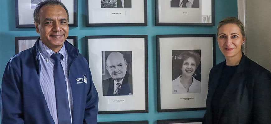 Pictured, standing with photographs of the late Philip Sceales and the late Janet Antrobus, are the Dean of Wits University’s Faculty of Health Sciences, Professor Shabir Madhi, and Assistant Dean of Research Professor Aletta Millen.