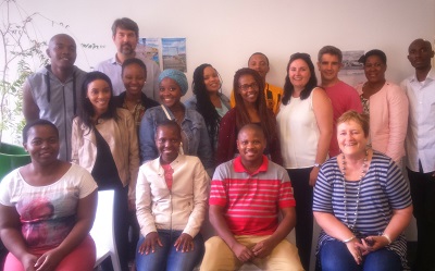 Prof Coleen Vogel (seated far right) and Prof Barend Erasmus, Director of GCSRI and Exarro Chair (last row on the left) at a lunch event with some of the students who attended the Introductory Course for Interdisciplinary Global Change Studies.   