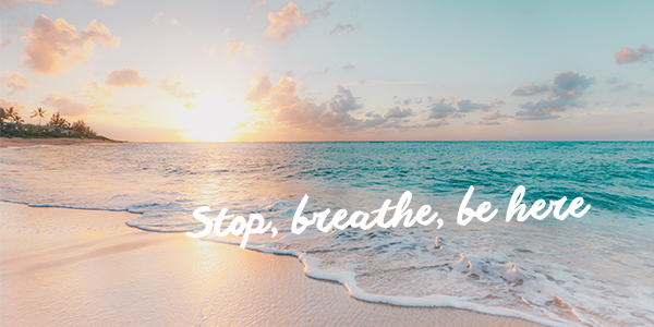 Seashore with sun with text stop, breathe, be here Seashore with sun with text stop, breathe, be here