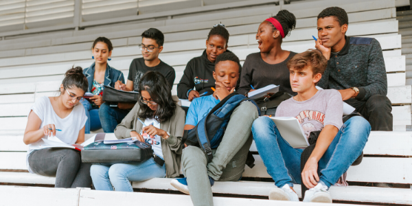 Students sitting on stands_image credit Shivan Parusnath